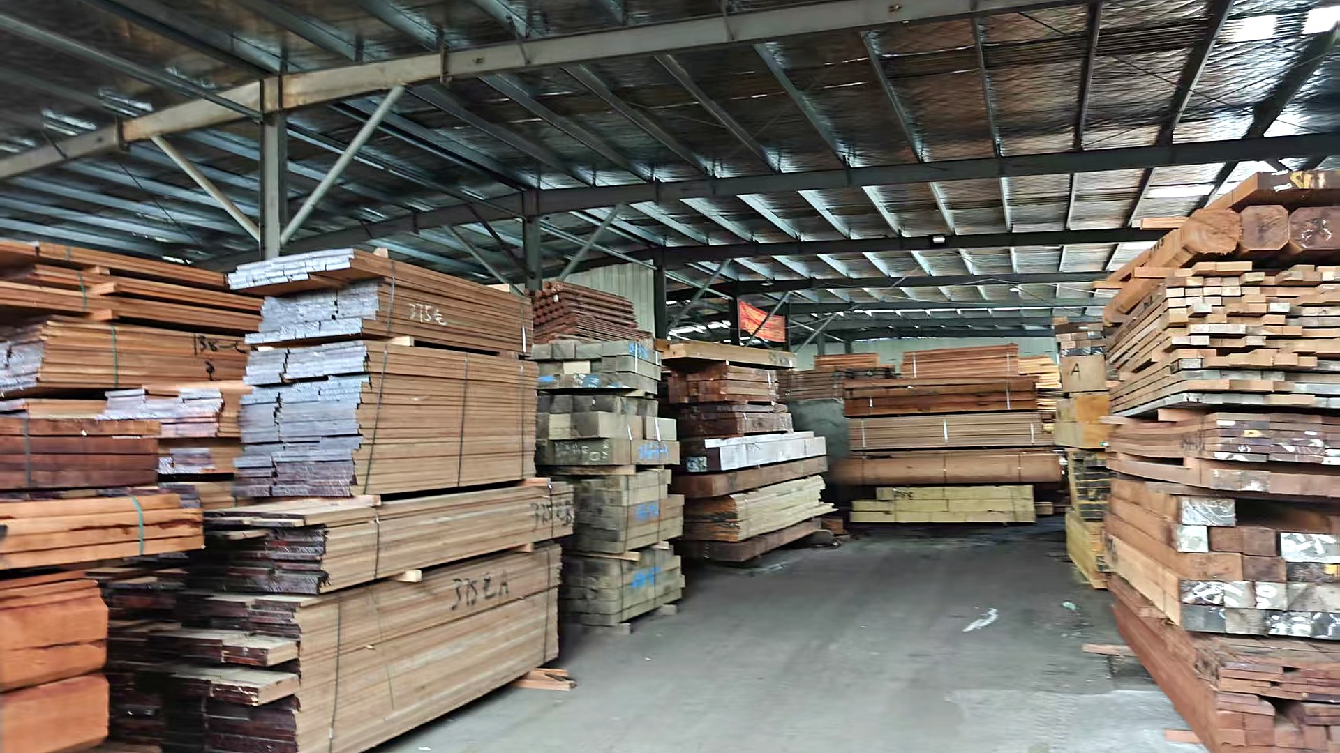 Factory warehouse with hardwood stock prepared for export